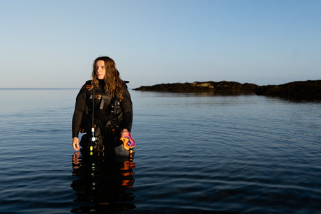 woman in water wearing apeks exotec bcd