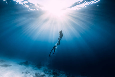 person freediving